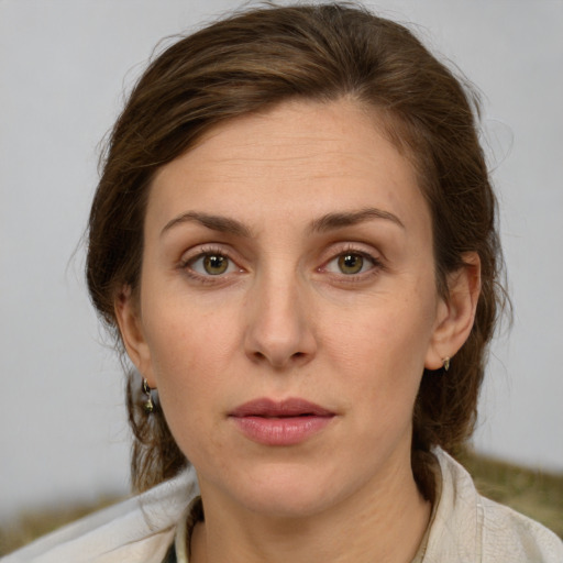 Neutral white young-adult female with medium  brown hair and brown eyes