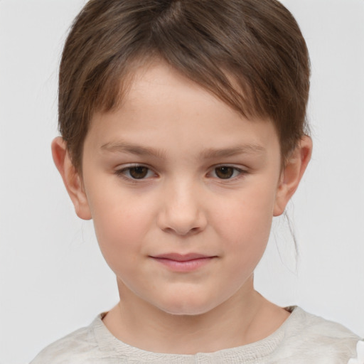 Joyful white child female with short  brown hair and brown eyes