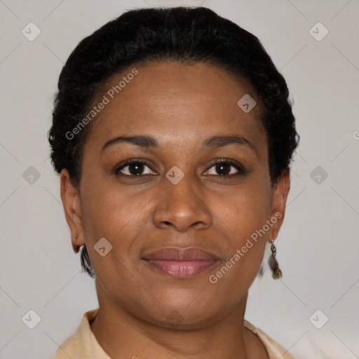 Joyful black adult female with short  brown hair and brown eyes