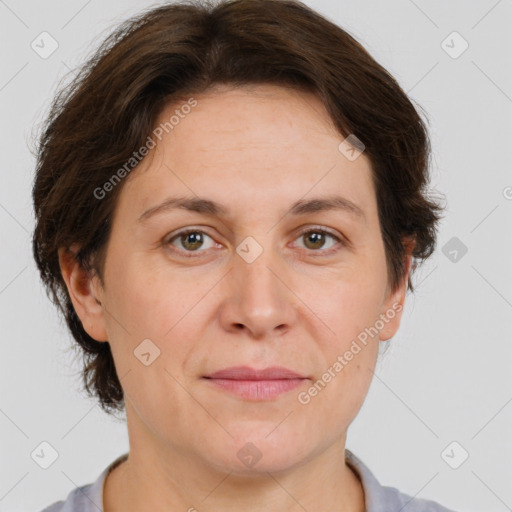 Joyful white adult female with short  brown hair and brown eyes