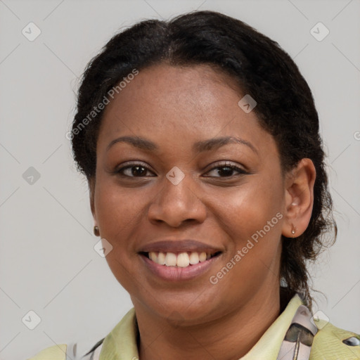 Joyful latino adult female with short  brown hair and brown eyes