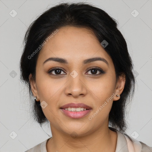 Joyful latino young-adult female with medium  brown hair and brown eyes