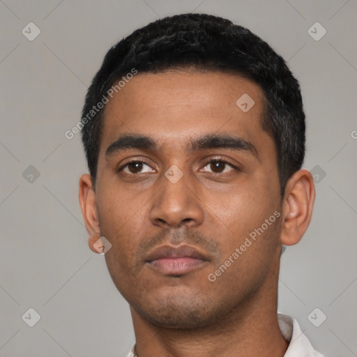 Neutral latino young-adult male with short  black hair and brown eyes