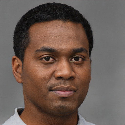 Neutral black young-adult male with short  black hair and brown eyes
