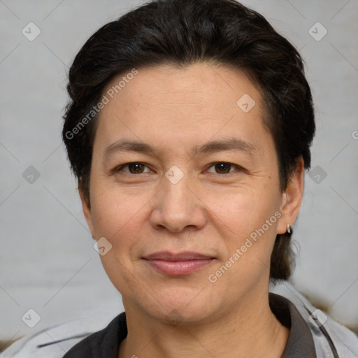 Joyful white adult female with short  brown hair and brown eyes