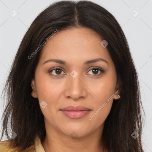 Joyful latino young-adult female with long  brown hair and brown eyes