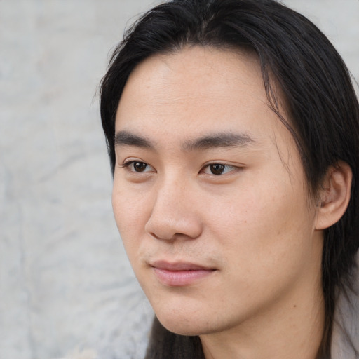 Neutral asian young-adult male with medium  brown hair and brown eyes