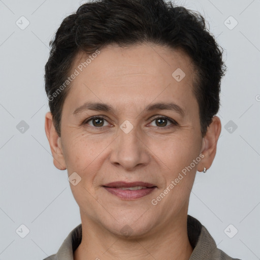 Joyful white adult female with short  brown hair and brown eyes