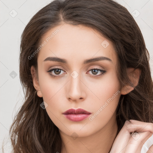 Neutral white young-adult female with long  brown hair and brown eyes