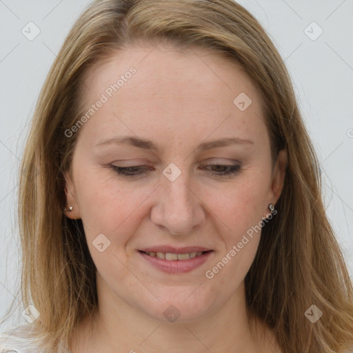 Joyful white adult female with long  brown hair and brown eyes