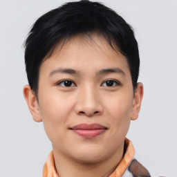Joyful asian young-adult female with short  brown hair and brown eyes