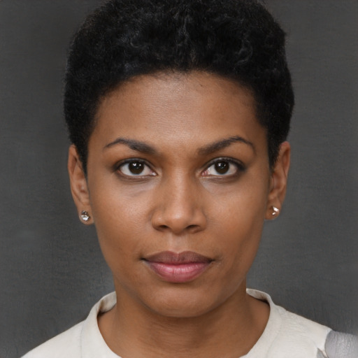 Neutral black young-adult female with short  black hair and brown eyes