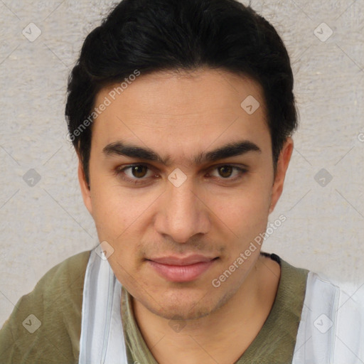 Joyful white young-adult male with short  black hair and brown eyes