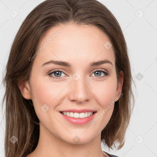 Joyful white young-adult female with long  brown hair and green eyes