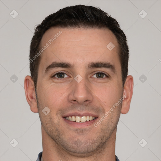 Joyful white young-adult male with short  brown hair and brown eyes