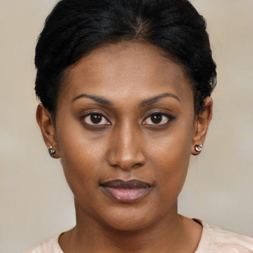 Neutral black young-adult female with short  black hair and brown eyes