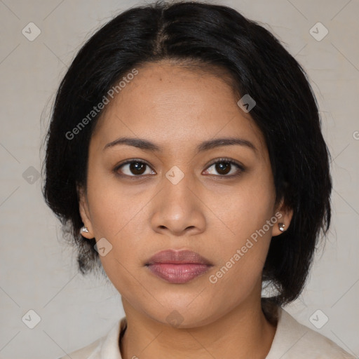 Joyful latino young-adult female with medium  black hair and brown eyes