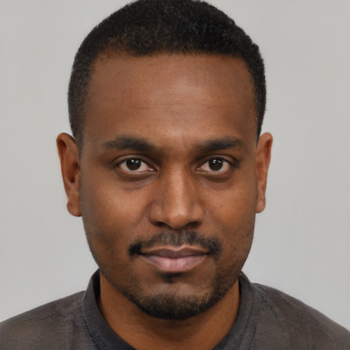 Neutral black young-adult male with short  black hair and brown eyes