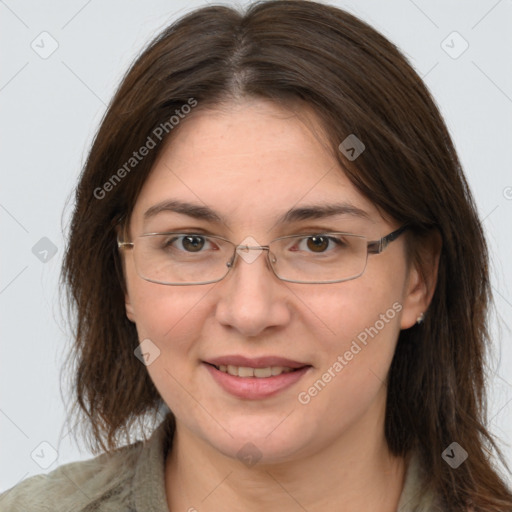 Joyful white adult female with medium  brown hair and brown eyes