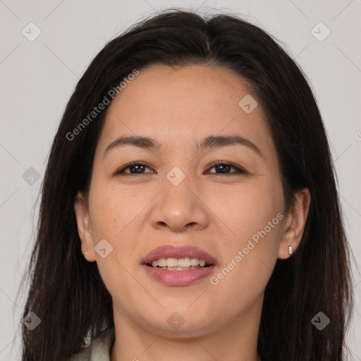 Joyful asian young-adult female with long  brown hair and brown eyes