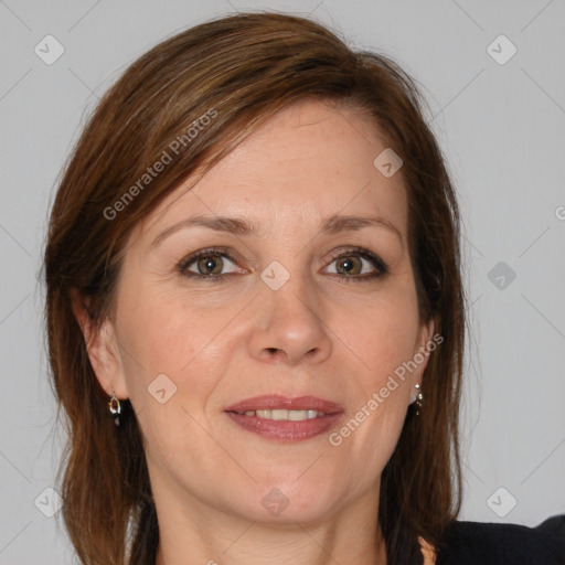 Joyful white adult female with medium  brown hair and grey eyes