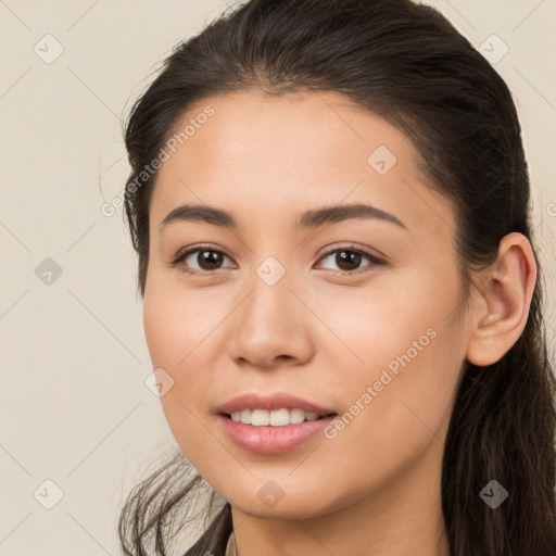 Joyful white young-adult female with long  brown hair and brown eyes