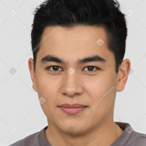 Joyful latino young-adult male with short  brown hair and brown eyes