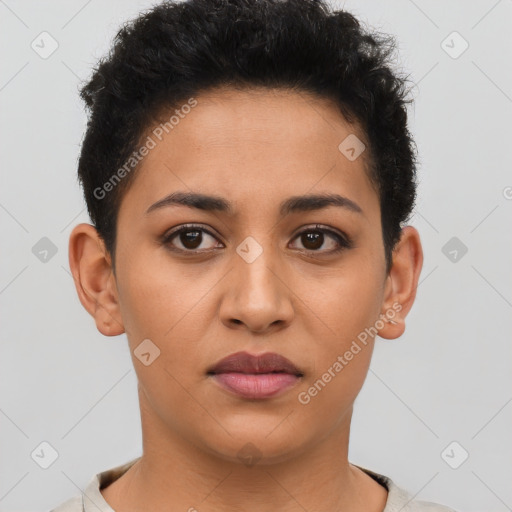 Joyful latino young-adult female with short  brown hair and brown eyes