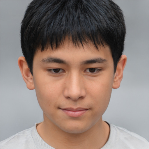Neutral asian child male with short  brown hair and brown eyes