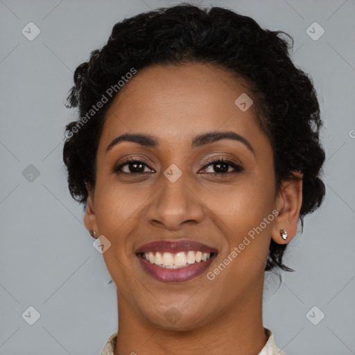 Joyful latino young-adult female with short  brown hair and brown eyes