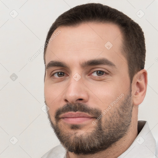 Neutral white young-adult male with short  brown hair and brown eyes