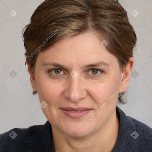 Joyful white adult female with medium  brown hair and grey eyes