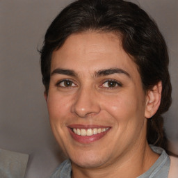 Joyful white adult female with medium  brown hair and brown eyes