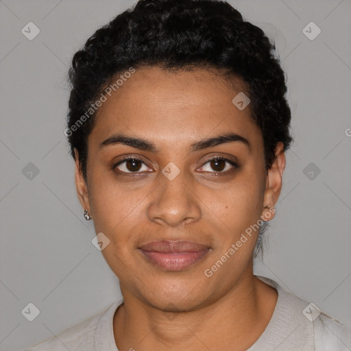 Joyful black young-adult female with short  black hair and brown eyes