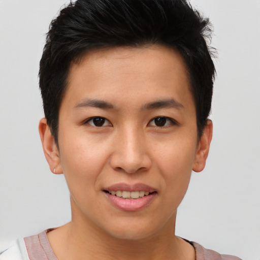 Joyful asian young-adult female with short  brown hair and brown eyes