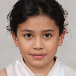 Joyful white child female with short  brown hair and brown eyes