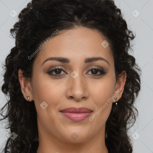 Joyful latino young-adult female with long  brown hair and brown eyes