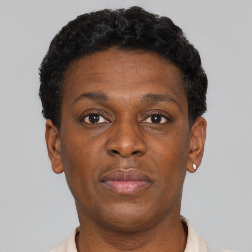 Neutral black young-adult female with short  brown hair and brown eyes