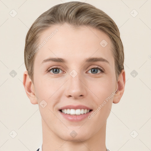 Joyful white young-adult female with short  brown hair and grey eyes