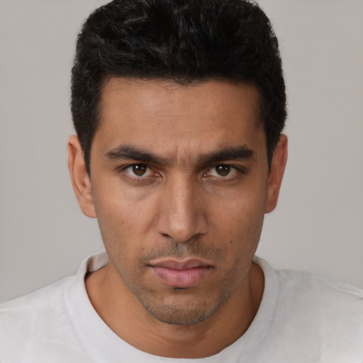 Neutral white young-adult male with short  black hair and brown eyes
