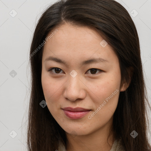 Joyful white young-adult female with long  brown hair and brown eyes