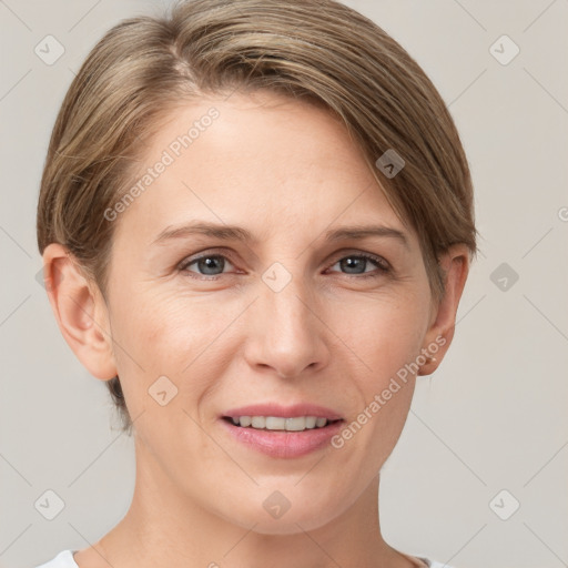 Joyful white young-adult female with short  brown hair and grey eyes