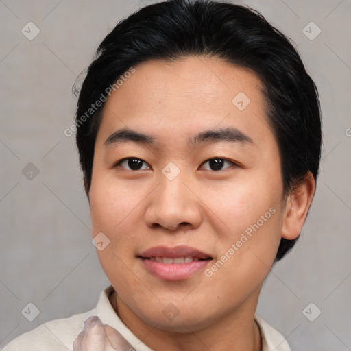 Joyful asian young-adult male with short  brown hair and brown eyes