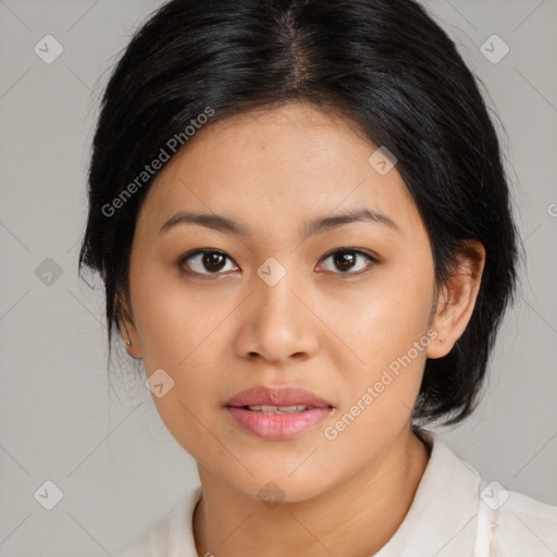 Joyful asian young-adult female with medium  black hair and brown eyes