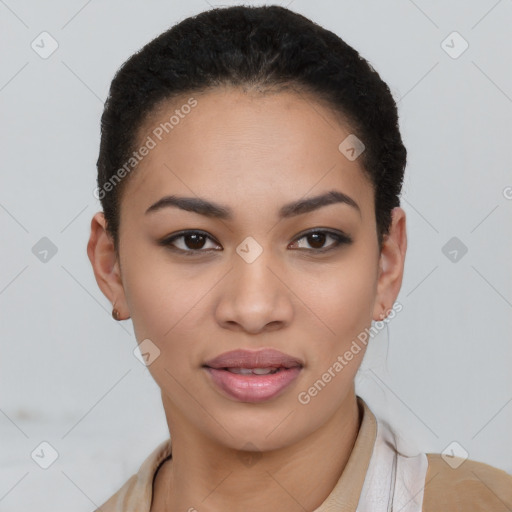 Joyful latino young-adult female with short  black hair and brown eyes