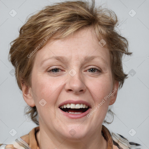 Joyful white adult female with medium  brown hair and blue eyes