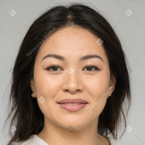 Joyful asian young-adult female with medium  brown hair and brown eyes