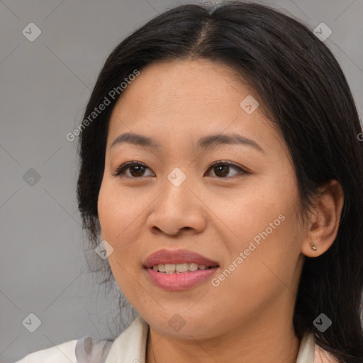 Joyful asian young-adult female with medium  brown hair and brown eyes