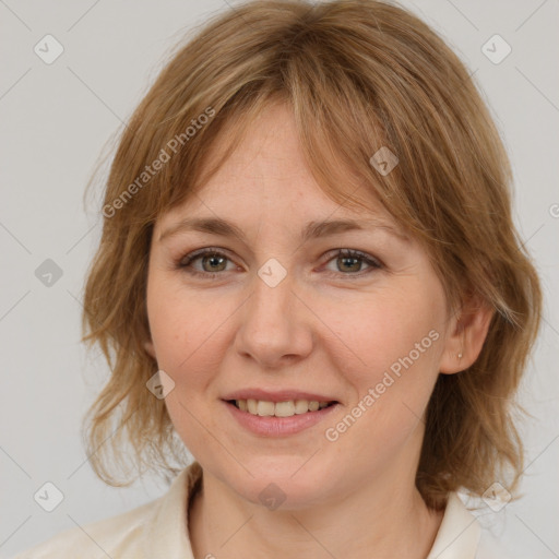 Joyful white young-adult female with medium  brown hair and blue eyes