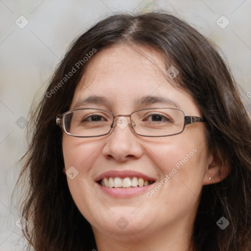 Joyful white adult female with long  brown hair and brown eyes